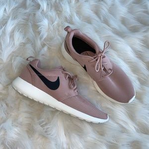 Nike sneakers in rose pink with black and white detailing. Size 8 1/2